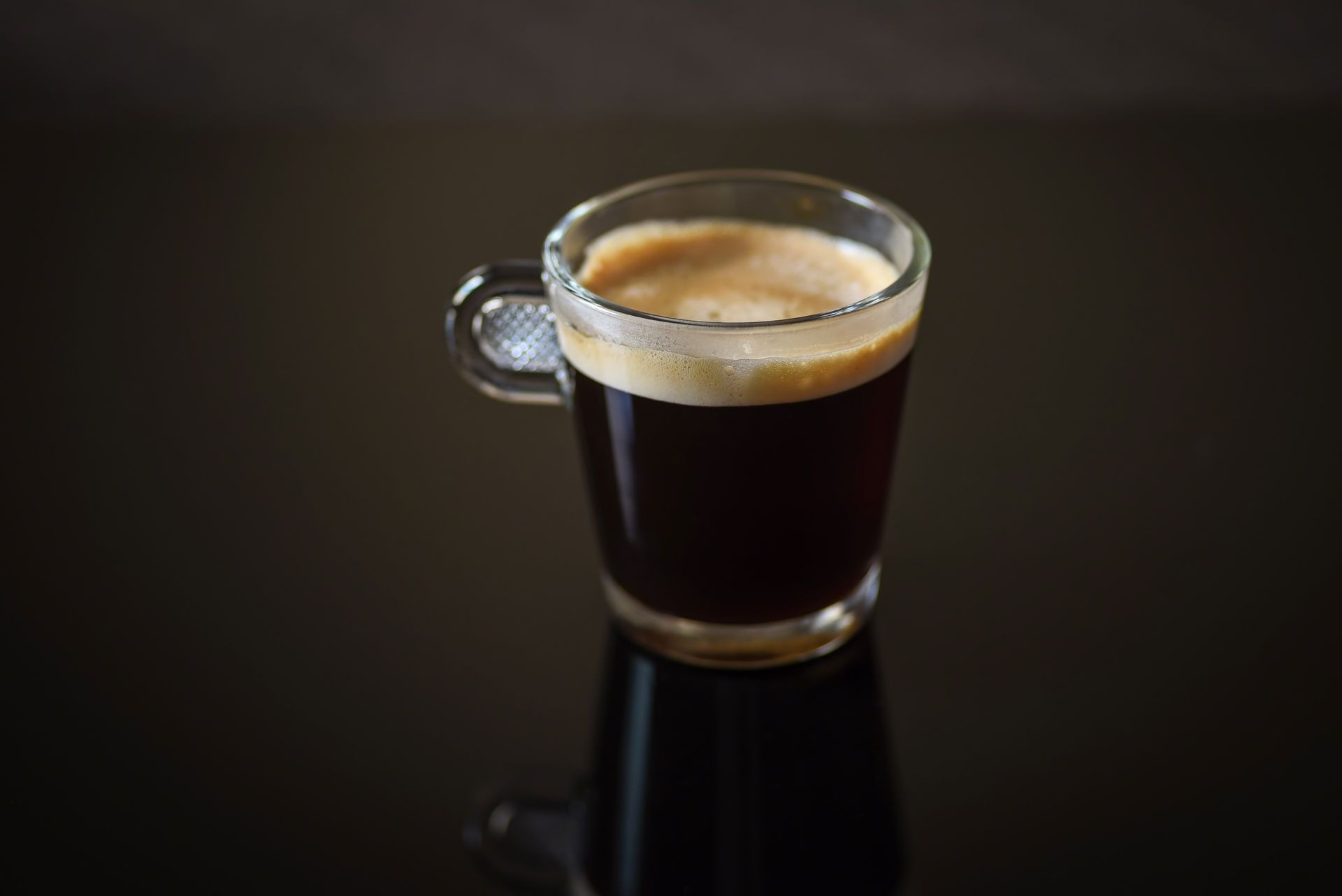 macro closeup of a single cup of cappuccino coffee - soft focus for effect